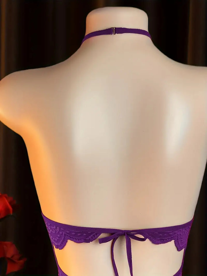 Sexy lace halter neck backless bodysuit with adjustable size and open-crotch design, featuring chest cut-out and sheer tight fit. New Valentine's Day style for passionate dates, daring lingerie outfit with exotic allure in purple.