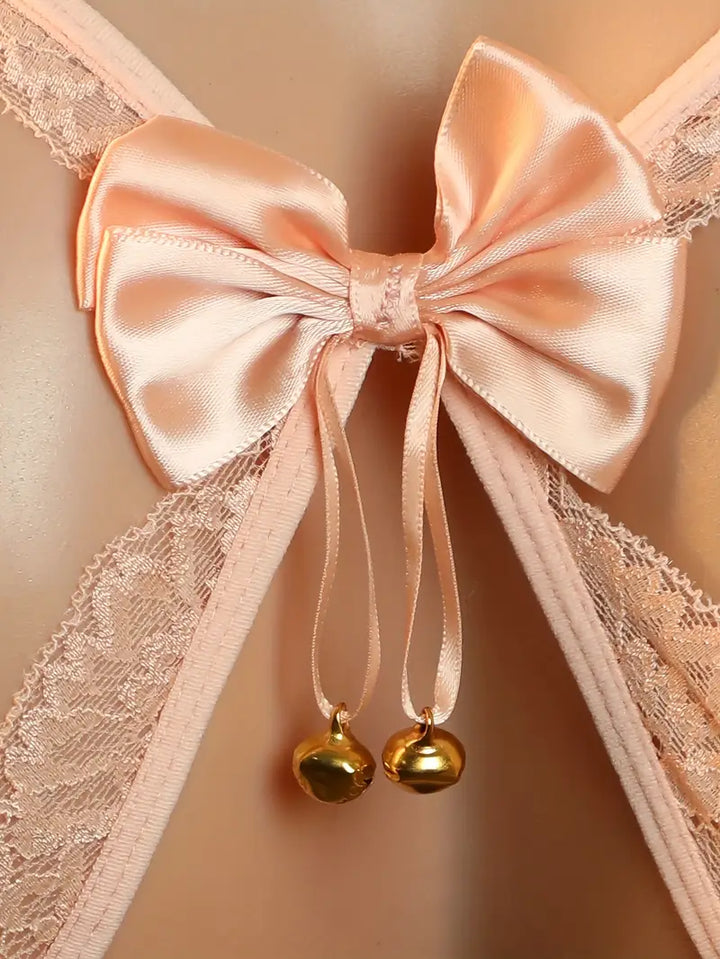 Sexy plus-size lingerie panties in pink lace with bow and bell, seductive sheer thong for teasing, open-crotch design for easy access, passionate new style with revealing exotic charm, alluring hollow-out thong underwear.
